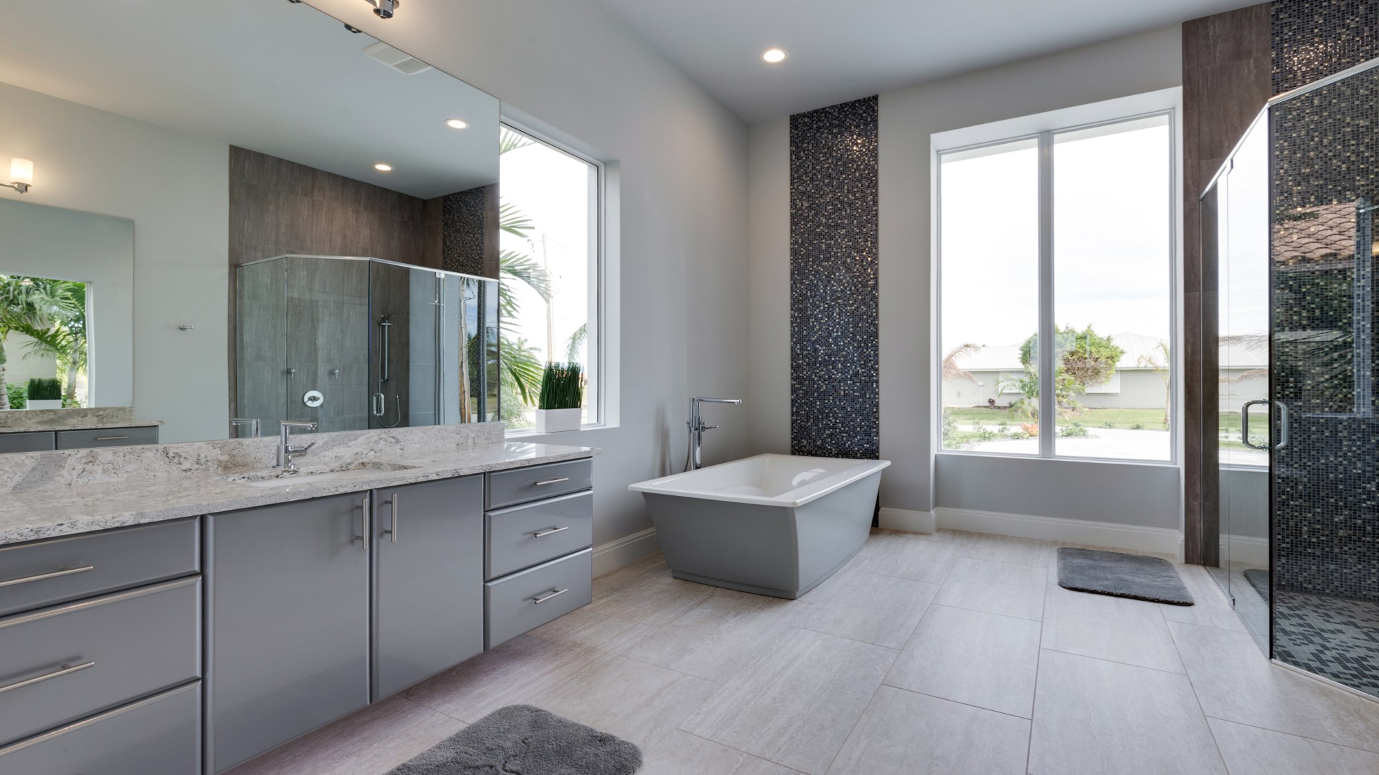 Luxury bathroom with double vanity and glass shower